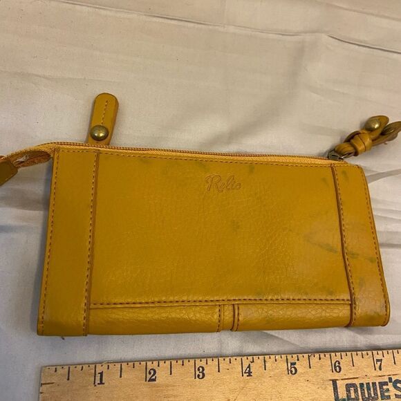 Relic wallet 7”x4” discoloration - Picture 1 of 5